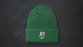 green beanie with AT glyph