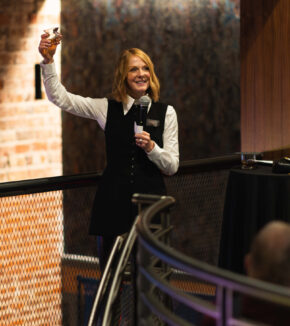 julie lifting a glass of fortunes fool