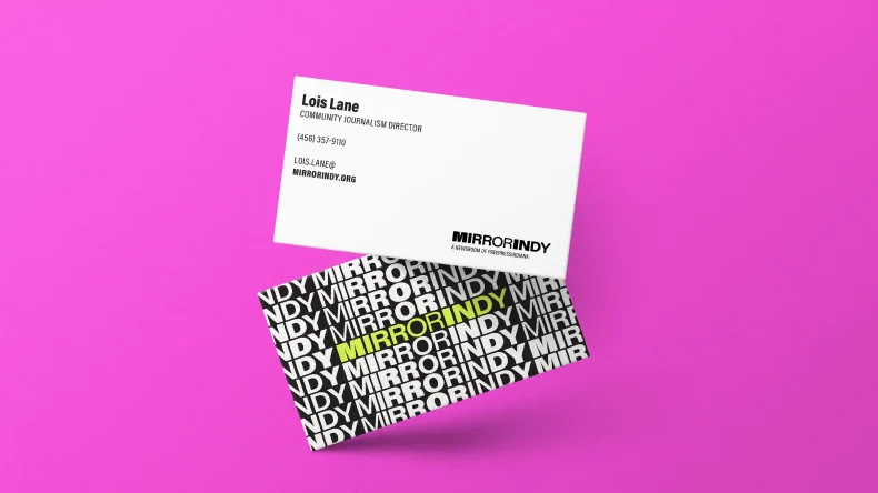 mirror indy business cards on a vibrant background