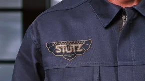 the-stutz-someraroad close up of branded coveralls