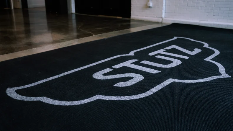 the-stutz-someraroad branded entrance rug