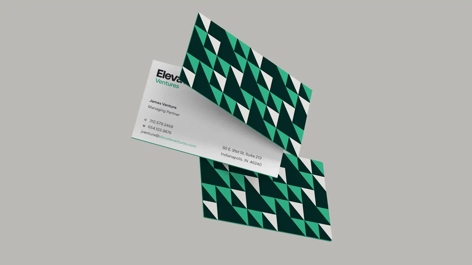 elevate ventures business card floating in air over a gray background