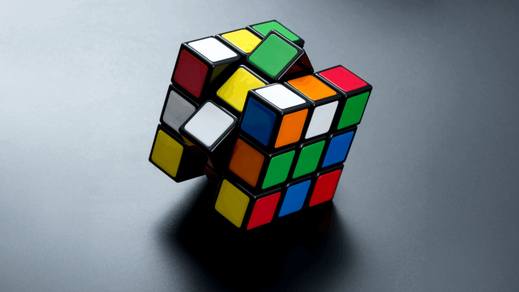 image of progressively complex, colorful building blocks