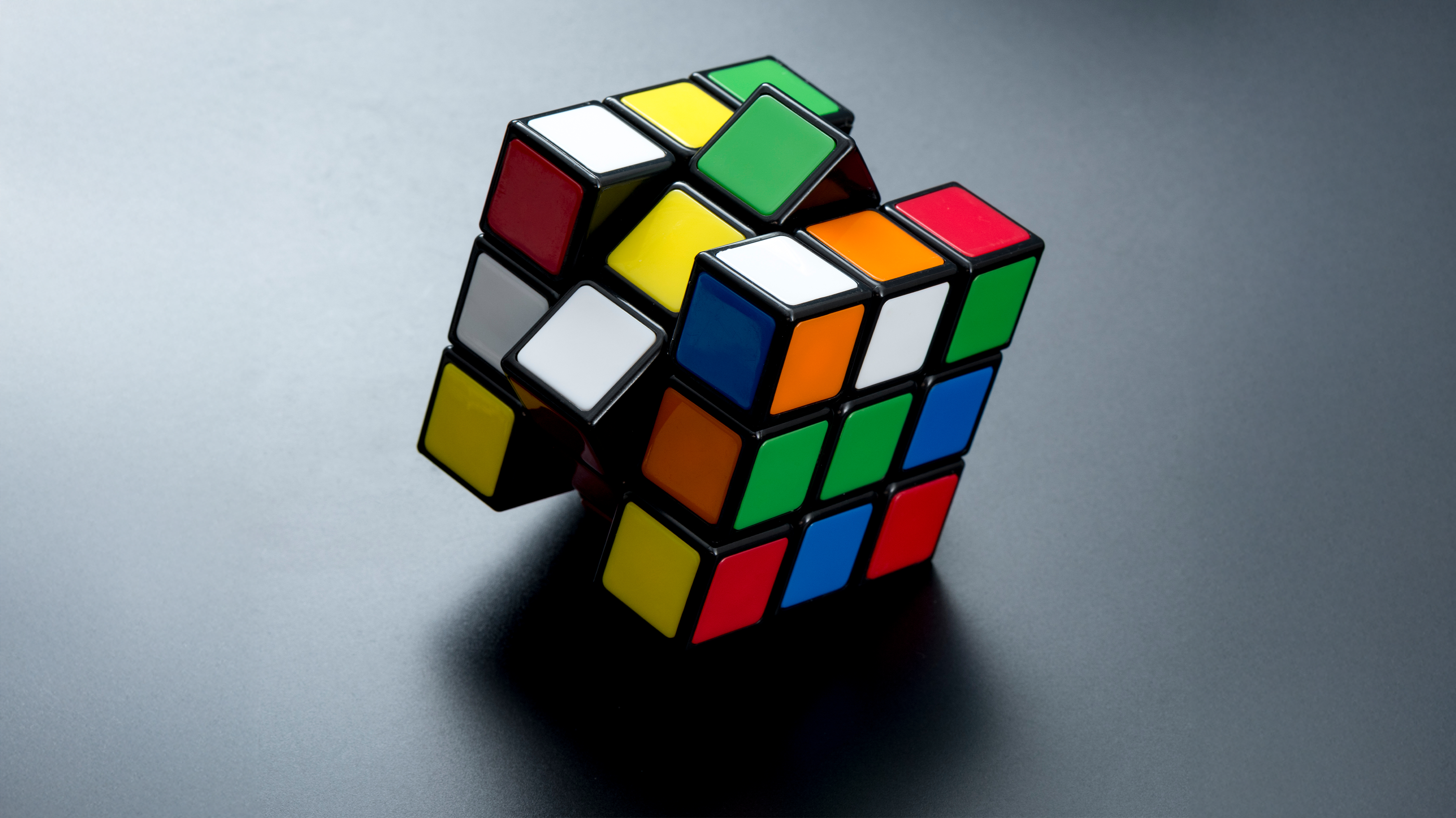 image of progressively complex, colorful building blocks