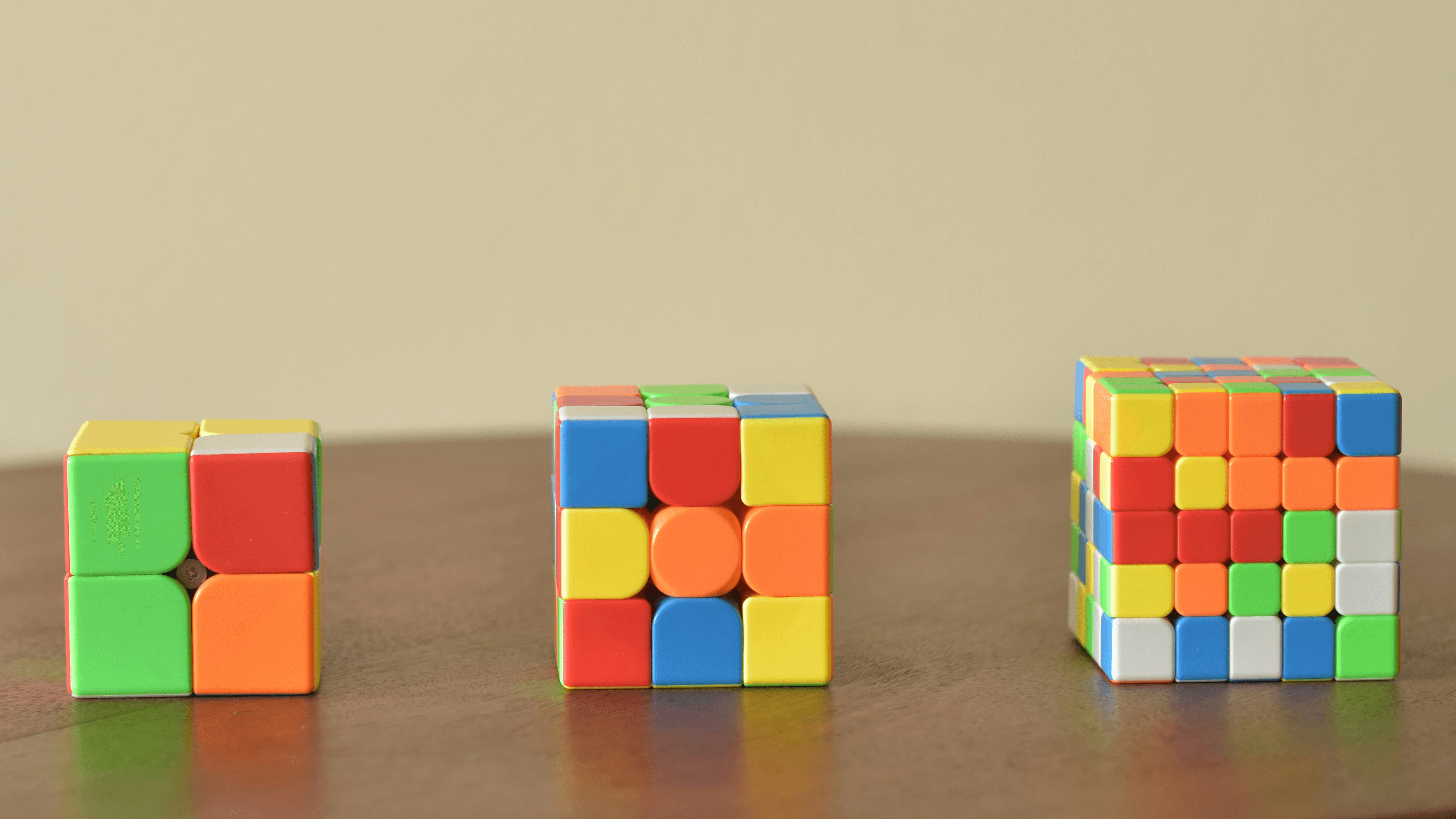 image of progressively complex, colorful building blocks