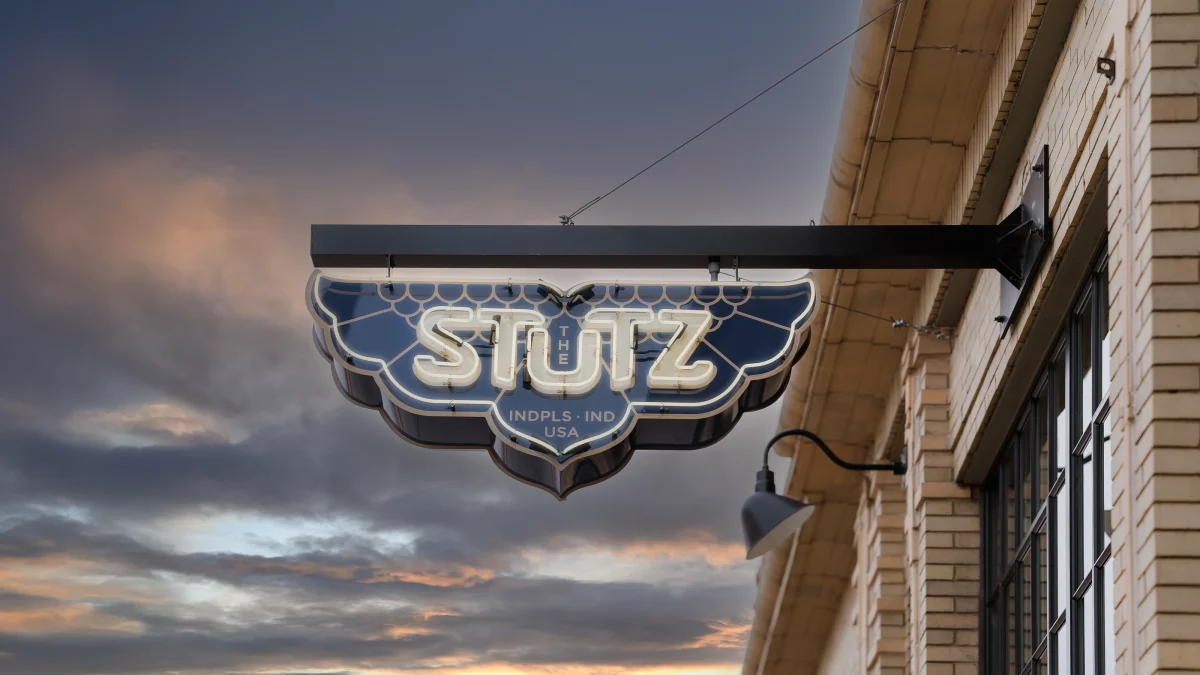 the-stutz-someraroad outdoor signage at sunset