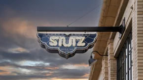 the-stutz-someraroad outdoor signage at sunset