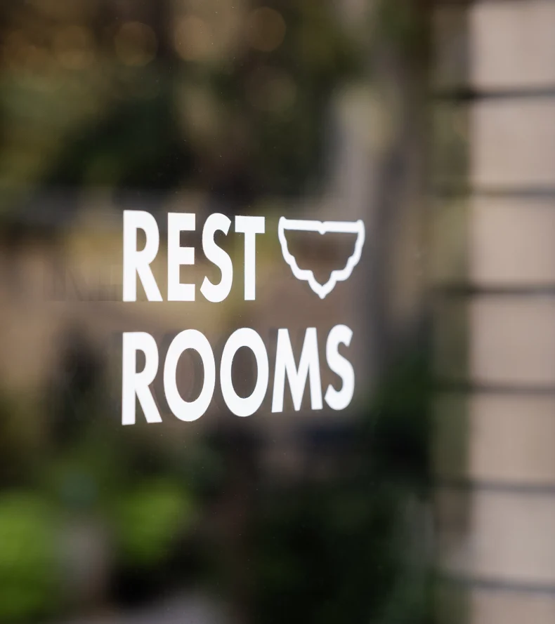 the-stutz-someraroad restroom vinyl window signage