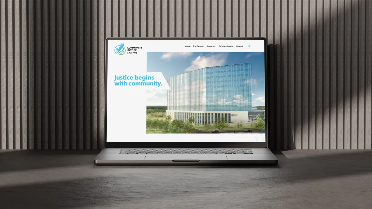 the cjc website on a laptop