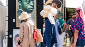 people attending an art fair